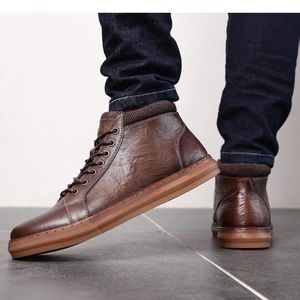 Brown leather boots. New with the box. Offer welcome .